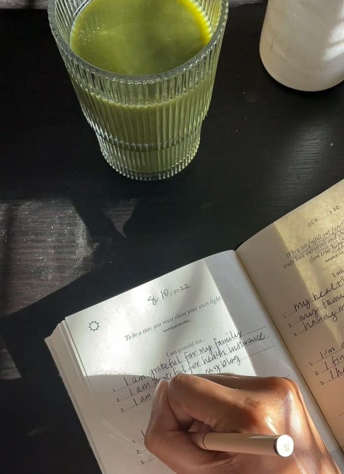 Sunday reset setup with a weekly planner, matcha, and simple checklist.